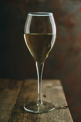White wine on the rustic background. Selective focus. Shallow depth of field.

