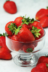 A bowl with ripe bright strawberry