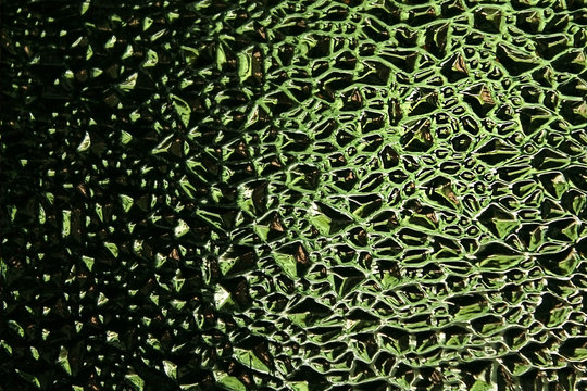 Light through patterned green glass