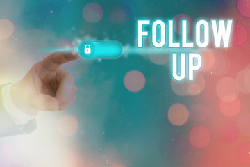 Conceptual hand writing showing Follow Up. Concept meaning a continuation of something that has...