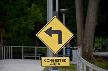 A warning sign on hiking trail in the park