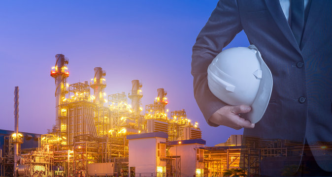 Double Exposure Of Engineer With Safety Helmet With Power Plant, Natural Gas Combined Cycle Power Plant And Turbine Generator With Blue Sky, Concept Energy, Engineering, Construction And Industrial