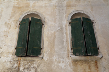 Italy,the windows of the ancient houses of the charming village of Polcenigo