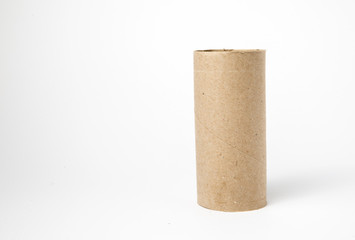 Image of cardboard toilet paper roll shot on white background in a studio with professional lighting for ecommerce. global pandemic people stacking up on toilet roll bulk buying and running out