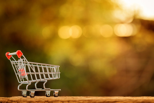 Basket put on the wooden in the public park, buying and shopping online concept.