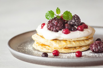 pancakes with berries and mint