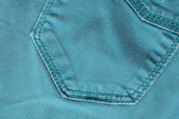 Details from jeans pants with seams and pockets