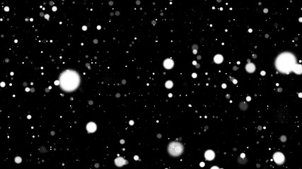 falling snowflakes on black background