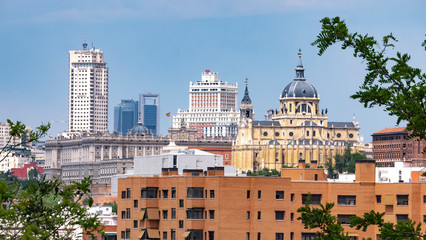 Fototapeta na wymiar MADRID, SPAIN - APRIL 20, 2020: SKYLINE OF MADRID WITHOUT CONTAMINATION DURING COVID-19. ROYAL PALACE, SPAIN SQUARE BUILDING, TOWER MADRID AND FINANCIAL DISTRICT TOWERS
