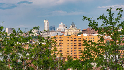 MADRID, SPAIN - APRIL 20, 2020: SKYLINE OF MADRID WITHOUT CONTAMINATION DURING COVID-19. ROYAL PALACE, SPAIN SQUARE BUILDING, TOWER MADRID AND FINANCIAL DISTRICT TOWERS