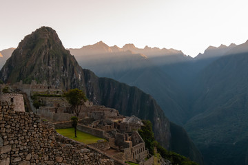 Peak of de Machupicchu with the rays of light of dawn
