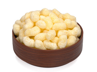 Unglazed sweet corn sticks in a plate on white background