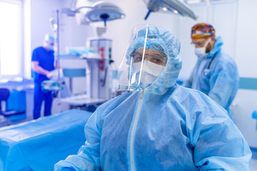 Coronavirus. Covid 19 infected patient in intensive care emergency room. Life saving. Ventilation of the lungs with oxygen.