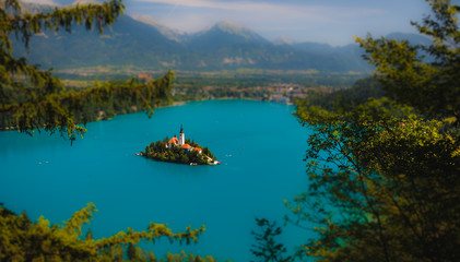 View of the island with a temple on Lake Bled. Tilt Shift Effect. Miniature effect.