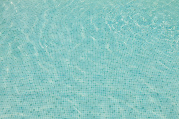 Turquoise blue surface of the water in the swimming pool