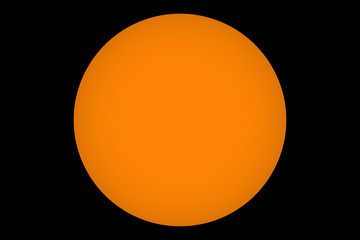 Big sphere circle in color orange like a moon on the black or dark background.