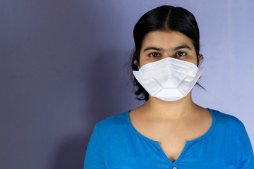 indian woman wearing nose mask