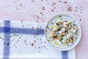 Cauliflower salad with spices and olive oil from above