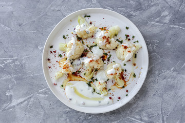 Cauliflower salad with spices and olive oil from above