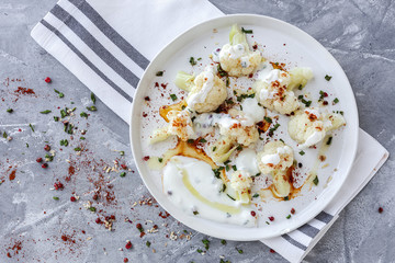 Cauliflower salad with spices and olive oil from above