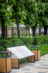 Park benches wrapped in connection with the coronavirus pandemic. social distance, forbidden to sit down, covid-19