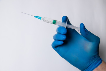 Syringe, medical injection in the hands, palms or fingers. Medicine plastic vaccination equipment...