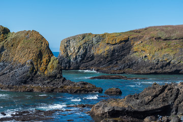 Fototapeta premium Large rock formations and Pacific Ocean in Oregon