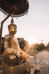 Ancient Buddhist temple at sunset in Chiang Mai, Thailand 