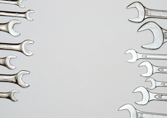 wrenches of different sizes on a gray background. father day