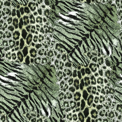 Seamless tiger, leopard skin. Black spots and stripes on a green background.