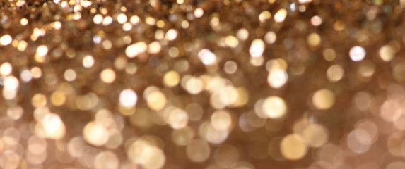 Christmas light background.  Holiday glowing backdrop. Defocused Background With Blinking Stars. Blurred Bokeh.