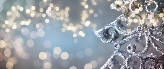 Christmas light background.  Holiday glowing backdrop. Defocused Background With Blinking Stars. Blurred Bokeh.