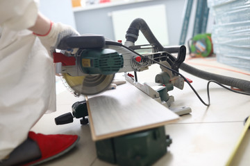 Professional foreman working in room