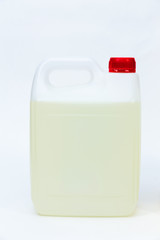 Plastic canister with liquid on white background.