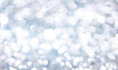 Christmas light background.  Holiday glowing backdrop. Defocused Background With Blinking Stars. Blurred Bokeh.