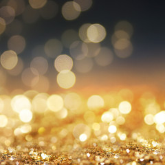 Obraz premium Christmas light background. Holiday glowing backdrop. Defocused Background With Blinking Stars. Blurred Bokeh.