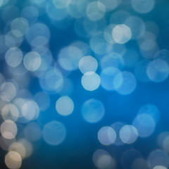 Christmas light background.  Holiday glowing backdrop. Defocused Background With Blinking Stars. Blurred Bokeh.