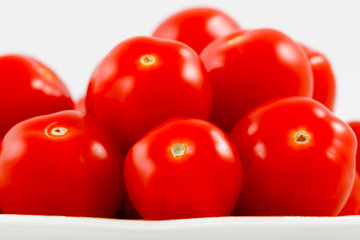 Group of tomatoes in a plate