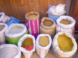 Bags of grains and pasta for sale in market