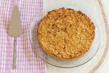 Homemade Roasted vegetable quiche pie Delicious vegetarian food. freshly baked
Onions carrots squash courgettes KUGEL