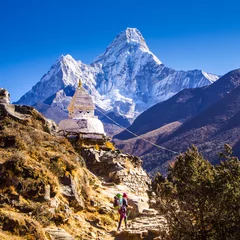Printed roller blinds Ama Dablam A woman with a large backpack, hiking on a rocky trail past a Buddhist Stupa with a snowy Ama Dablam peak behind.