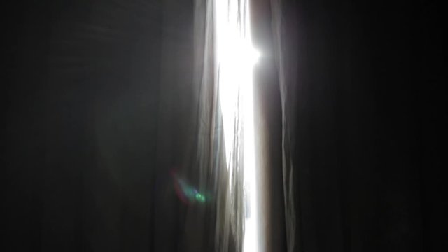 Morning sun light peeking through the half open curtain (60fps)