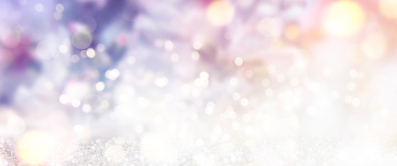 Spring Bokeh light background.  Holiday glowing backdrop. Defocused Background