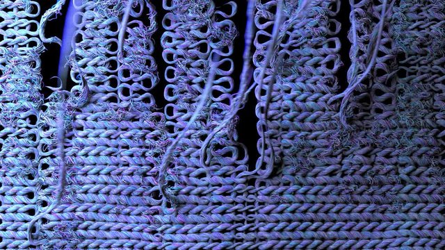 Close Up Of The Process Of Multiciolored Fabric Knitting and Knitted Texture. Animation of Cloth Making.