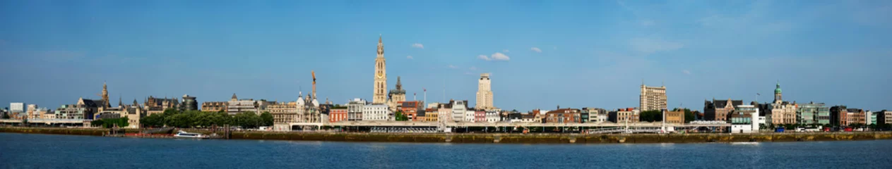 Foto op Plexiglas Panorama of Antwerp over the River Scheldt with Cathedral of Our Lady Onze-Lieve-Vrouwekathedraal Antwerpen, Belgium. © Dmitry Rukhlenko