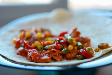 Preparing Fish Tortilla Sandwich with Vegetables