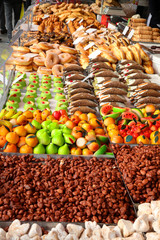 pastry shop window with many pastries and toasted almonds and fr