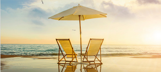 Background with couple of deck chairs at sunset, Travel concept, Summer background