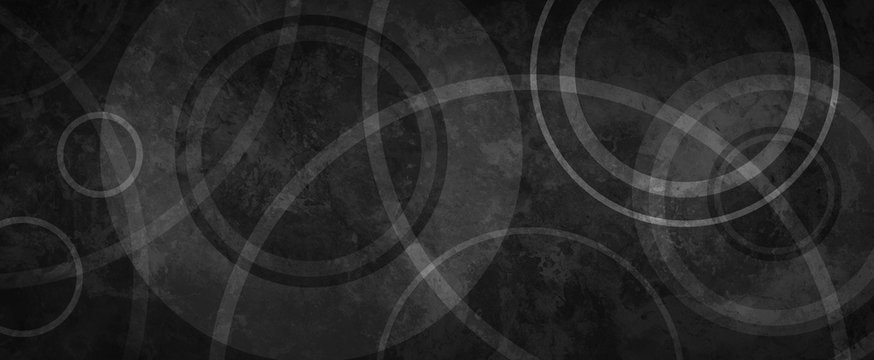 Black background with white circle rings in faded distressed vintage grunge texture design, old geometric black pattern paper