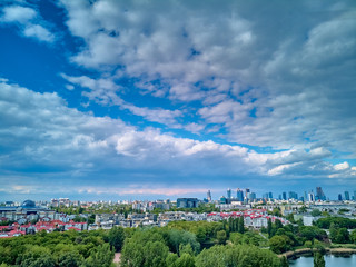 Fototapeta premium A beautiful panoramic view of the sunset in a fabulous evening on Szczesliwice Park - a former village, currently a housing estate in the Ochota district in Warsaw, Poland